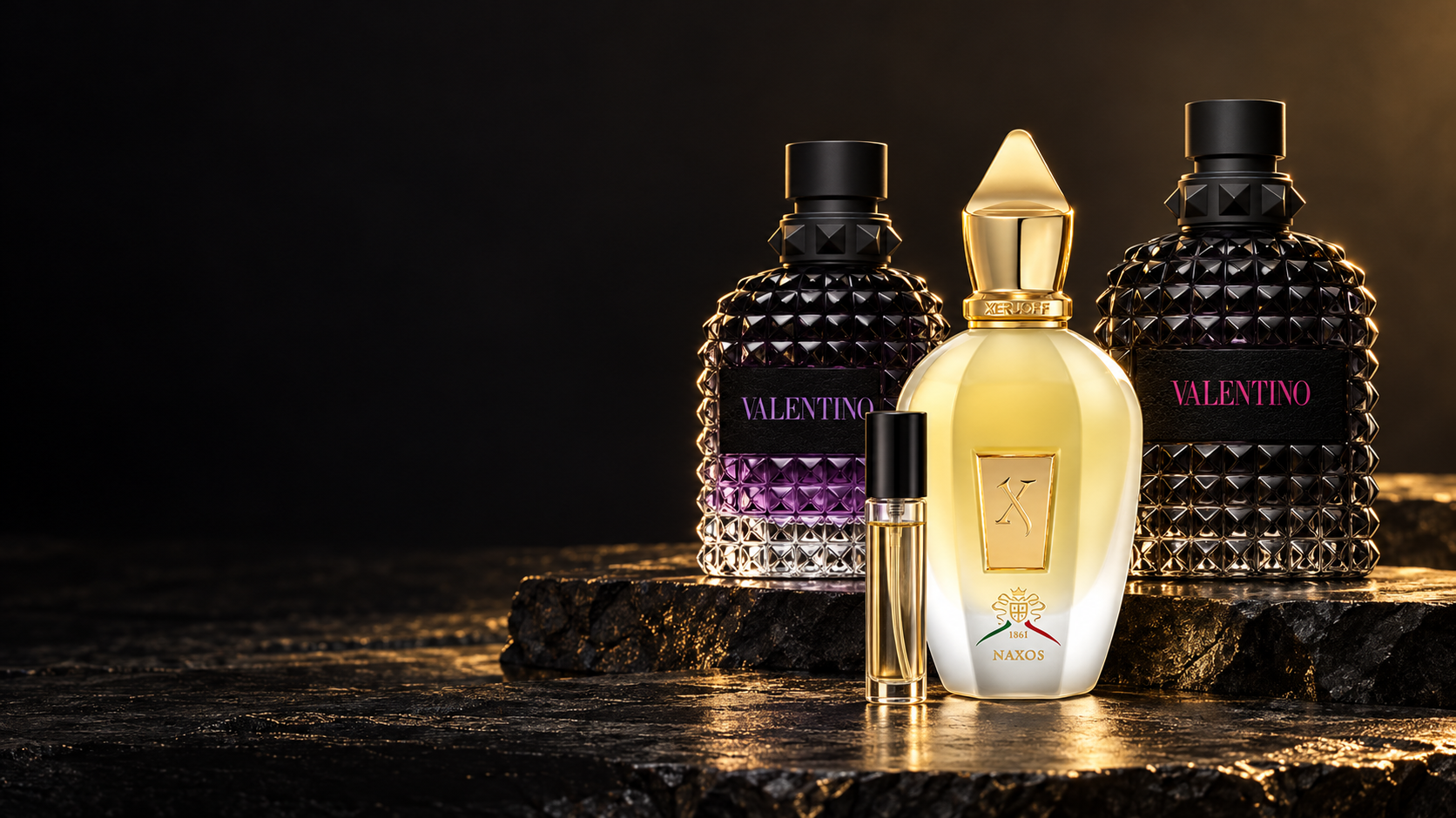 Composición de referencia con Naxos, Valentino Uomo Purple Melancholia, Uomo Extradose y un atomizador de decant